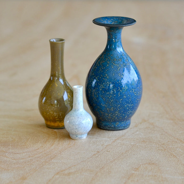 One more of the Miniature Hand Thrown Ceramic Vase Trio in Spotted Blue, Brown and Moonstone White.