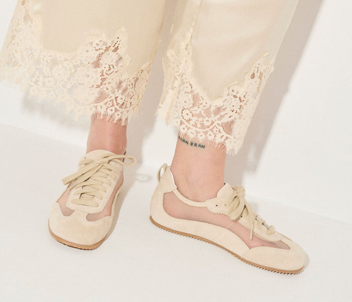 Freda Salvador Minnie ballet sneaker in beige suede, featuring a sleek design and comfortable fit, shown from a side angle.