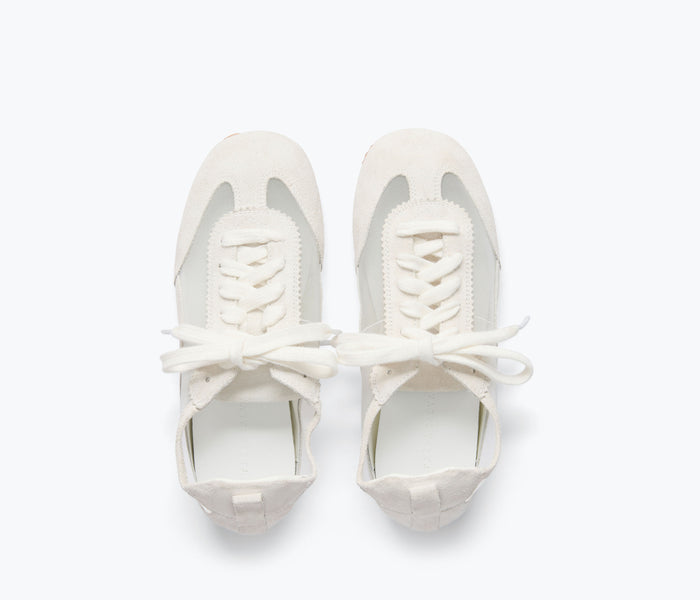 Freda Salvador Minnie ballet sneaker in ivory suede with a rounded toe and low-profile design, perfect for casual wear.