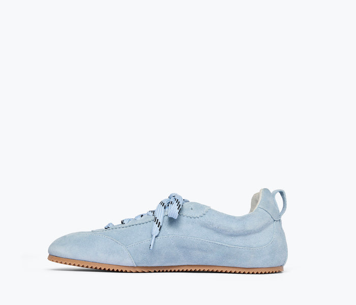 Sky blue Minnie ballet sneaker by Freda Salvador, showing the inside view with cushioned interior and stylish design details.