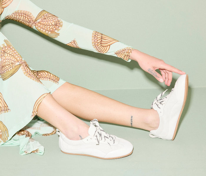 Fredas Salvador Minnie Ballet Sneaker in milk calf leather with a sleek, comfortable design and subtle branding.