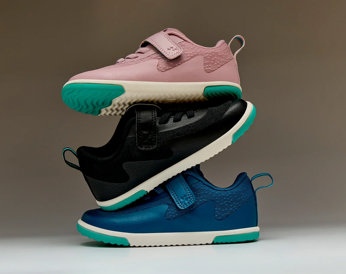 Side view of stacked Ten Little MotionX Sneakers - Stardust Pink, Space Black, Cosmic Blue. Available at www.tenlittle.com