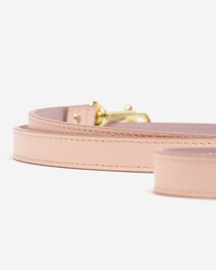 Close-up of Nara blush pink leather dog leash detailing and high-quality stitching