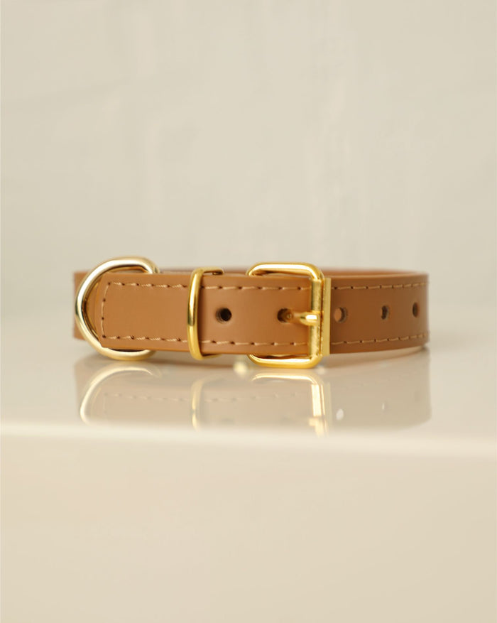Stylish studded dog collar in camel leather with adjustable comfortable fit . Updated May 2026.