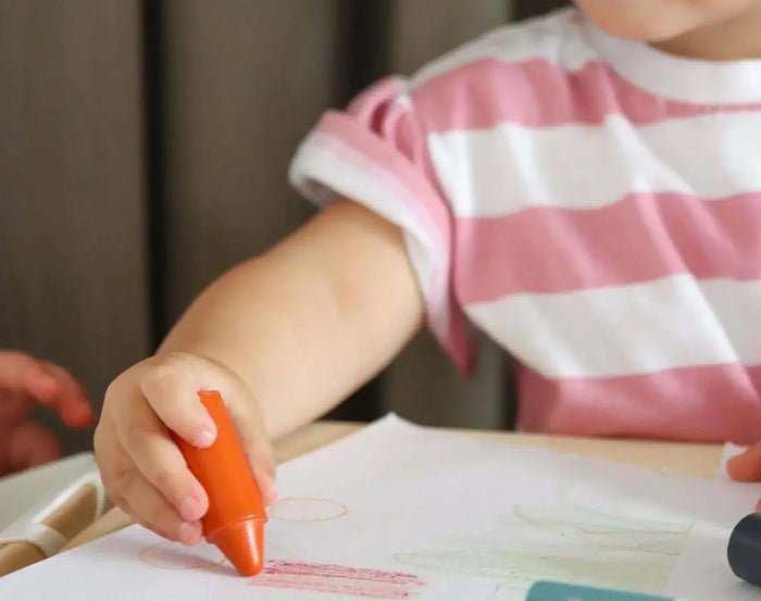 Child drawing with Honeysticks Natural Beeswax Crayones - Set of 10. Available at www.tenlittle.com
