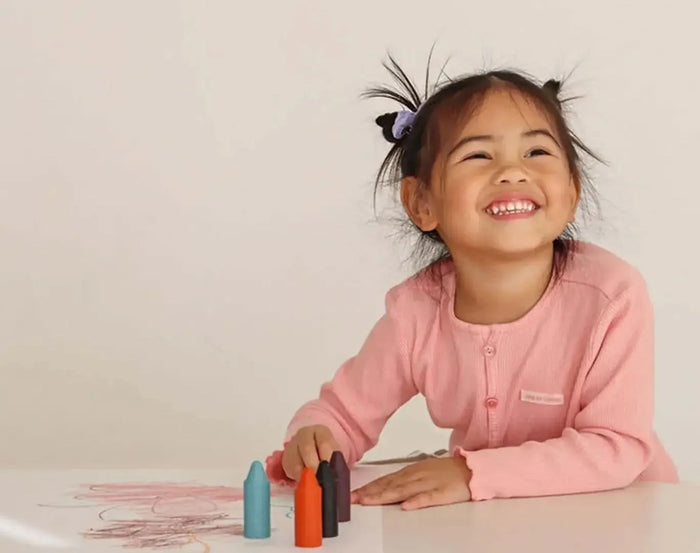 Child drawing with Honeysticks Natural Beeswax Crayones - Set of 10. Available at www.tenlittle.com