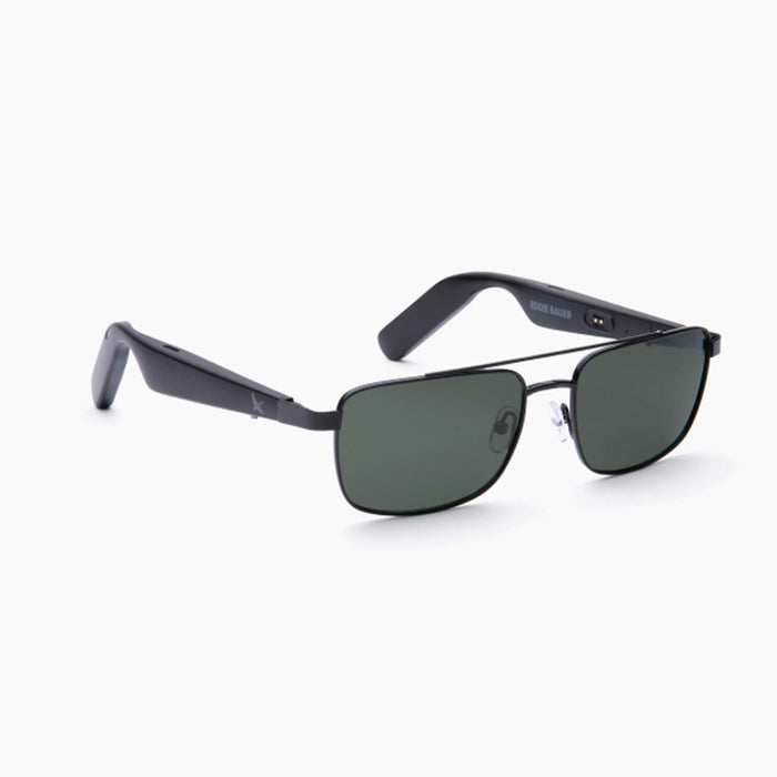 The Eddie Bauer Navigator sunglasses feature rectangular black frames and dark green UV400 polarized lenses, shown slightly open against a white background.