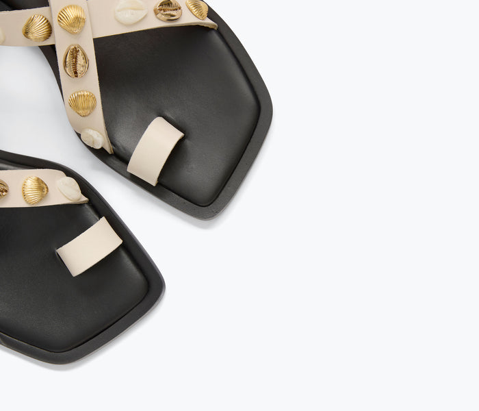 Freda Salvador PAXTON sandal in bone calf leather with gold shell embellishments and open toe design.