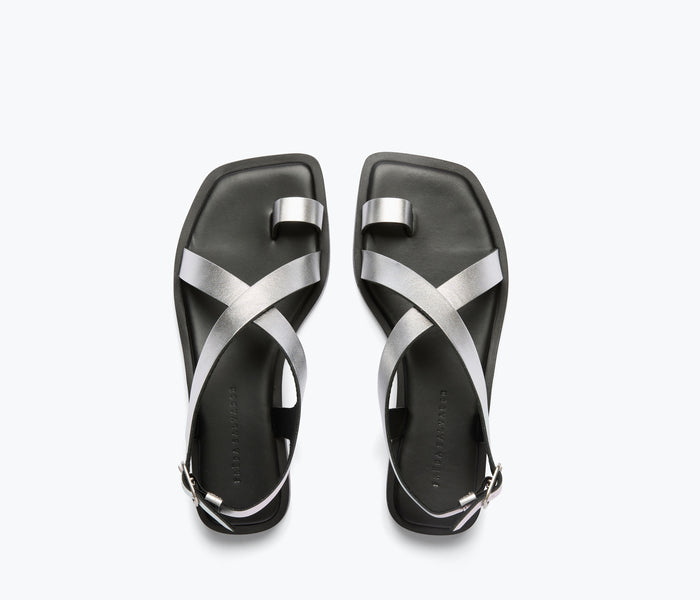 Freda Salvador Paxton sandal in silver with calf leather straps, stylish open-toe design, and ankle buckle.