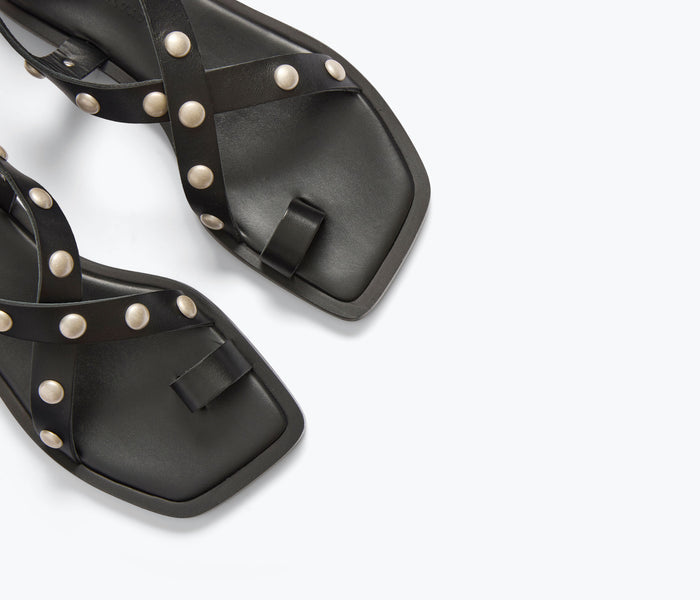 Freda Salvador Paxton Black Sandal with silver stud detailing, open-toe design and slide style for casual summer wear.