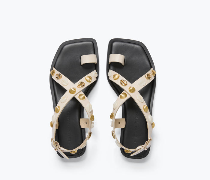 Freda Salvador Paxton sandal in bone calf leather with gold shell embellishments, showcasing a stylish open-toe design.