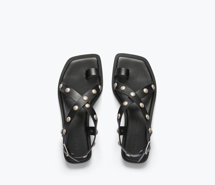 FREDA SALVADOR Paxton sandal in black with silver stud accents, featuring a stylish open-toe design and ankle strap.