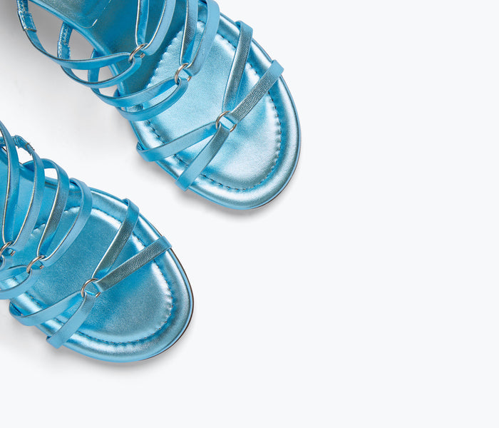 Freda Salvador Pippa heel in blue metallic finish, showcasing elegant pointed toe and sleek stiletto heel detail.