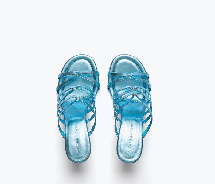 Blue metallic PIPPA heel by FREDA SALVADOR with pointed toe and sleek design, shown from the top view.
