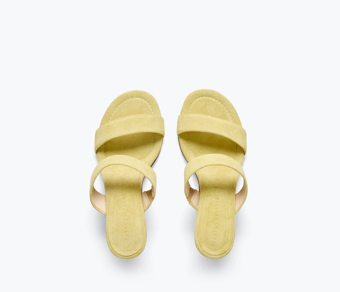 Freda Salvador Poppy double strap heel in vibrant citrus suede, showcasing the stylish heel design and textured top detail.