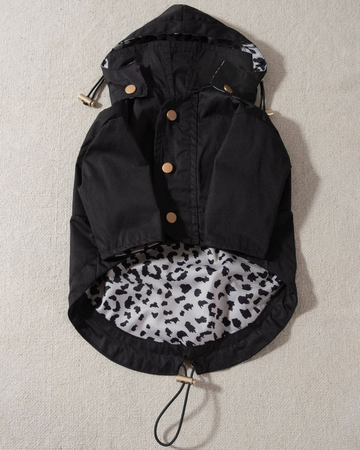 black dog raincoat with leopard print lining and removable hood. pug dog raincoat