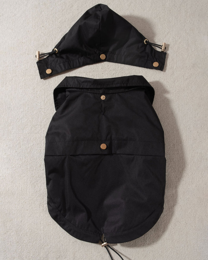 black dog raincoat with leopard print lining and removable hood. chihuahua raincoat
