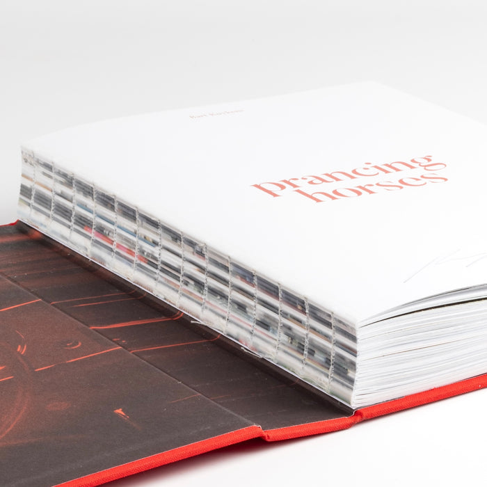 Close up of Suisse binding on Prancing Horses that allows for a flat view.
