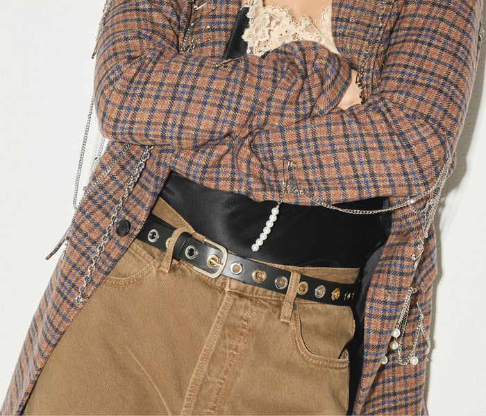Freda Salvador Rebecca Belt with grommet details, stylish leather belt featuring metal eyelets and adjustable buckle.