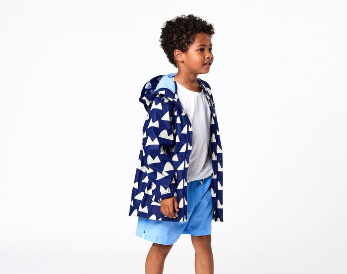 Kid wearing Snapper Rock - Fleece Lined Recycled Waterproof Raincoat - Mountain - Available at www.tenlittle.com