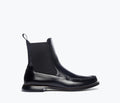 Freda Salvador Renn black Chelsea boot with sleek leather upper and classic slip-on style, front view.
