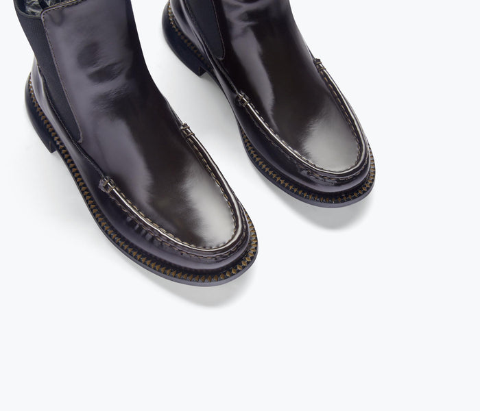 Freda Salvador Renn Moccasin Chelsea Boot in espresso leather with detailed stitching and classic ankle boot design.