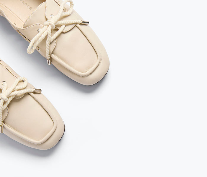 Freda Salvador RIA soft boat shoe loafer in vanilla nappa leather with detailed stitching and sleek design.