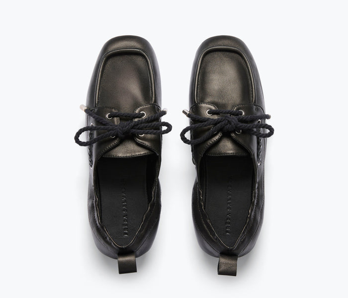 Black RIA Soft Boat Shoe loafer by Freda Salvador, featuring smooth nappa leather and sleek slip-on design.