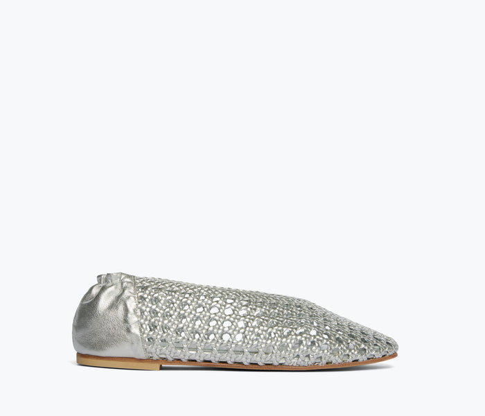 Freda Salvador Riley open weave ballet flat in silver metallic with front view showing textured woven design and sleek shape.