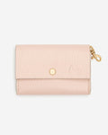 Rocco blush pink leather dog waste bag holder, front view, stylish pet accessory
