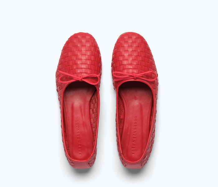 Red Roma round toe ballet flat by Freda Salvador, featuring a sleek design and comfortable flat sole.