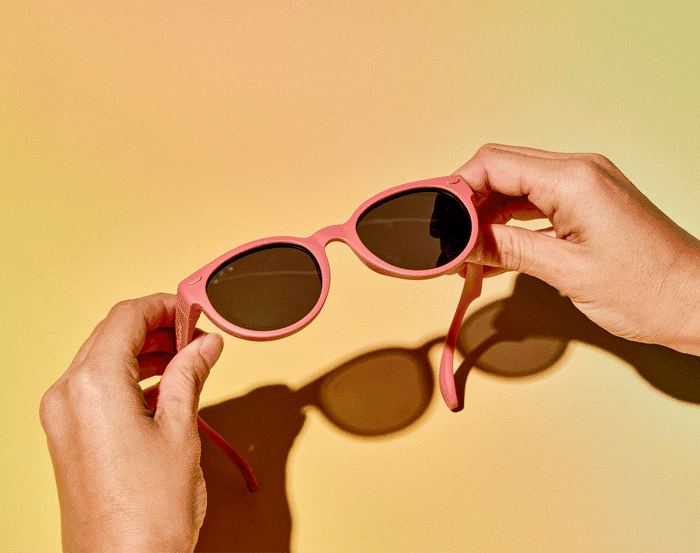 GIF flexing Roshambo Round Sunglasses - Dusty Rose. Available at www.tenlittle.com