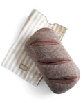 plush baguette dog toy with squeakers and enrichment pockets, interactive toy for treat hiding and play