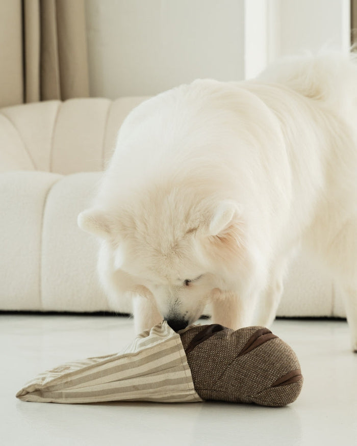 soft textured dog toy designed for enrichment and play, plush toy with multiple squeakers and pockets