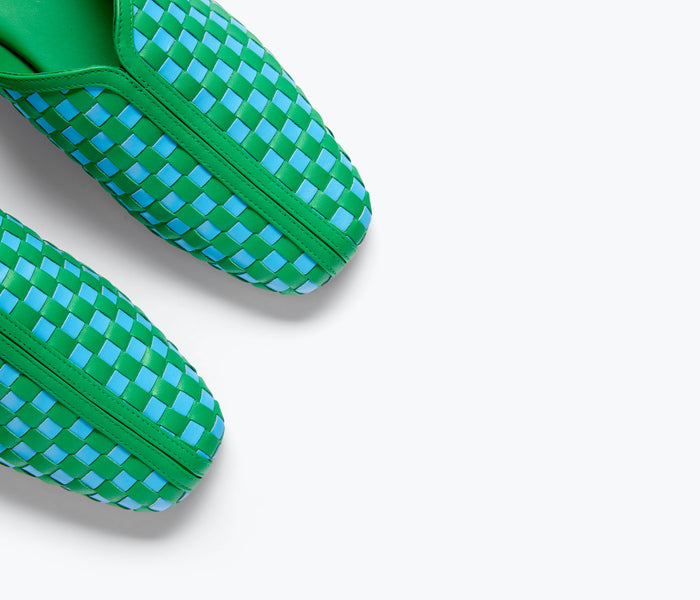 Freda Salvador Saanvi woven leather slide mule with green and blue woven details, stylish slip-on footwear.