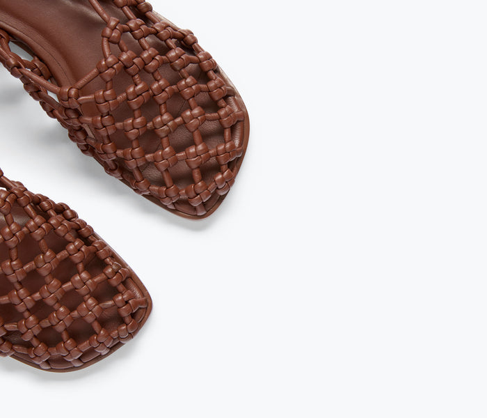 Fredrick Salvador Sally woven leather flat shoe in chocolate with knotted calf detail, showcasing elegant craftsmanship and style.