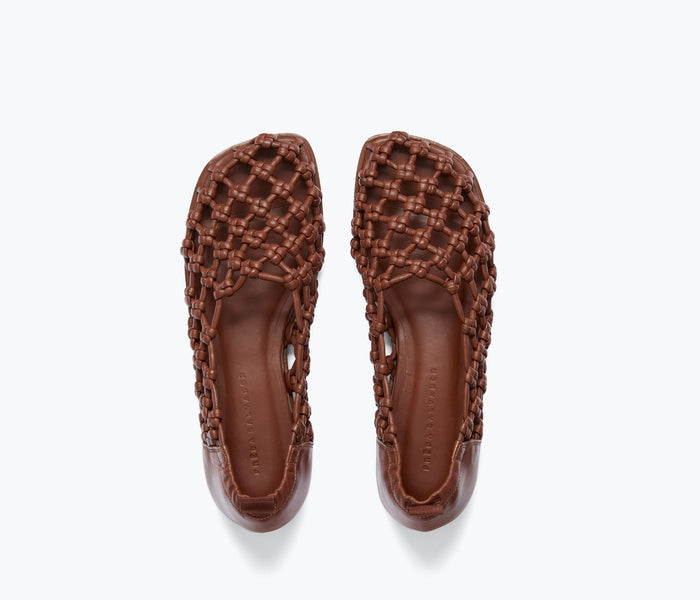 Freda Salvador Sally woven leather flat in chocolate with knotted calf top, showcasing stylish and comfortable slip-on footwear.