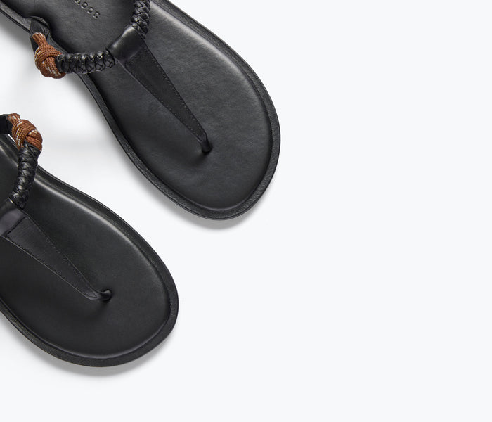 Freda Salvador Selah Rope Thong Sandal in chocolate with woven rope strap, close-up detail of the stylish, minimalist design.