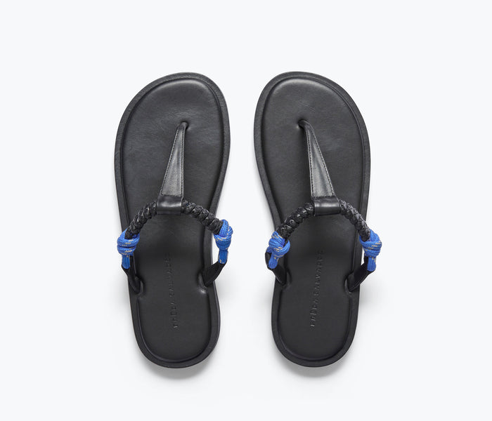Freda Salvador Selah Rope Thong Sandal in cobalt with woven rope straps and minimalist design on a neutral background