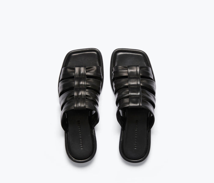 Black nappa leather Selena Cloud Mule sandal by Freda Salvador with a sleek, minimalist design and open back.