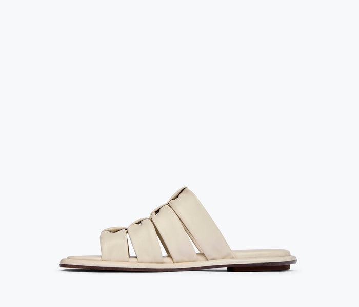 Freda Salvador Selena Cloud Mule Sandal in vanilla napa leather, showing the inside view with soft, cushioned interior.