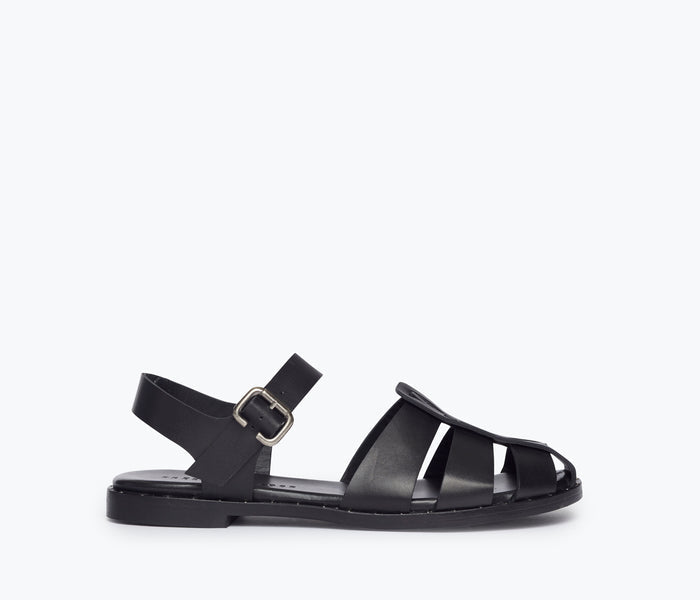 Black SERA FISHERMAN SANDAL by FREDA SALVADOR featuring a closed-toe design and adjustable strap, front view.