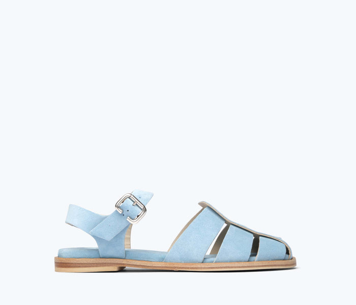 Blue suede SERA FISHERMAN sandal by FREDA SALVADOR with front view showing stylish straps and comfortable design.