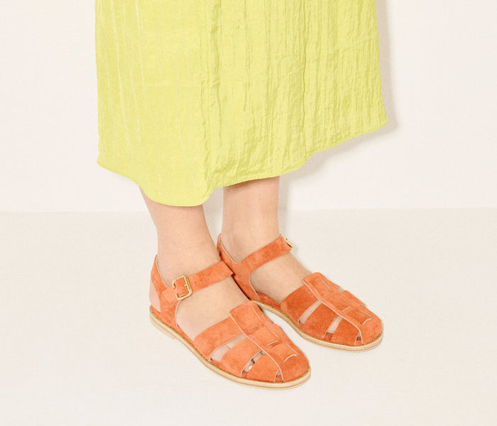 Fredas Salvador SERA Fisherman Sandal in cantaloupe color, featuring a strappy design and comfortable slip-on style.