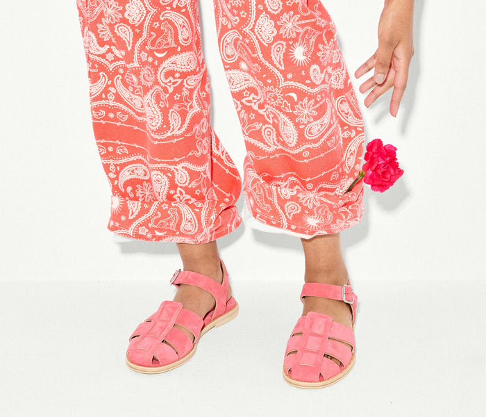 Freda Salvador SERA Fisherman Sandal in watermelon suede, featuring a woven strap design and open-toe style.