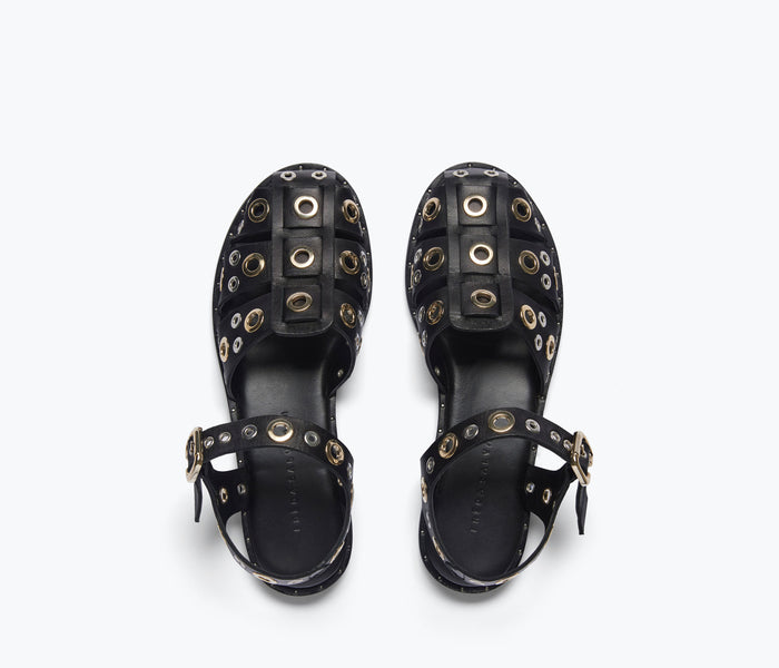 Black SERA Fisherman sandal by FREDA SALVADOR with grommet details, featuring a closed toe and stylish strap design.