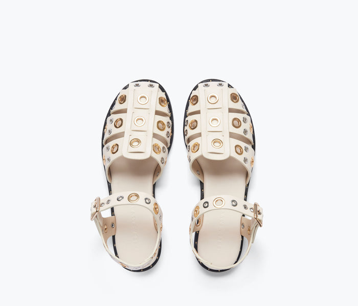 Freda Salvador Sera Fisherman Sandal in bone color with grommet details, showcasing the stylish open-toe design and textured straps.