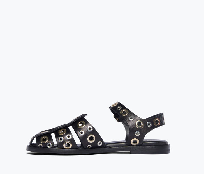 Black SERA Fisherman sandal by FREDA SALVADOR with grommet details, shown from inside view.