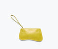 Freda Salvador Serena slip pouch in mustard crinkle calf leather, compact bag with sleek design and gold zipper closure.