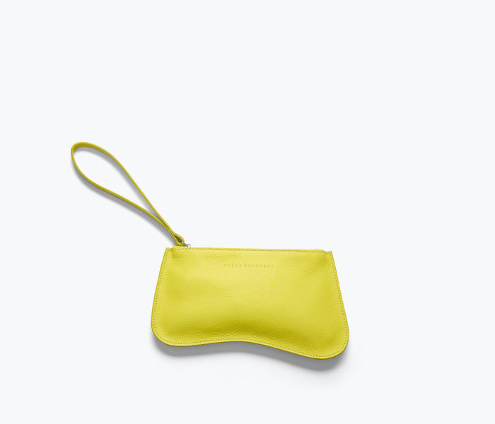 Freda Salvador Serena slip pouch in chartreuse pebbled leather, front view showing compact, stylish bag with sleek design.